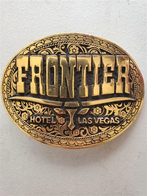 frontier hotel las vegas belt buckle.